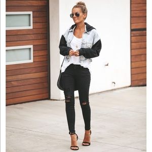 Distressed denim and black jacket